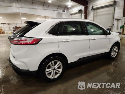 Trzecie zdjęcie samochodu z tyłu: 2020 FORD EDGE SEL VIN:2FMPK4J95LBA29943 - miniatura