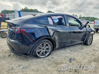 Trzecie zdjęcie samochodu z tyłu: 2023 TESLA MODEL Y VIN:7SAYGDEE7PA082962 - miniatura