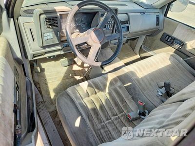 Zdjęcie 8 z 12 samochodu: 1993 GMC SIERRA K1500 VIN:1GTEK14KXPZ502151 - miniatura