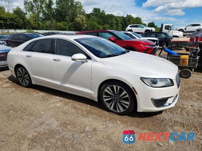 Czwarte zdjęcie samochodu z boku: 2017 LINCOLN MKZ RESERVE VIN:3LN6L5F95HR622654 - miniatura