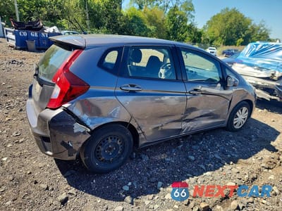 Trzecie zdjęcie samochodu z tyłu: 2017 HONDA FIT LX VIN:JHMGK5H56HS011041 - miniatura