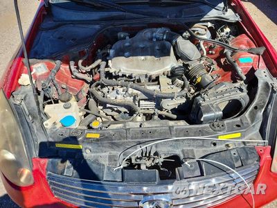 Zdjęcie 11 z 12 samochodu: 2004 INFINITI G35 BASE VIN:JNKCV54E04M304556 - miniatura