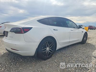 Trzecie zdjęcie samochodu z tyłu: 2022 TESLA MODEL 3 VIN:5YJ3E1EB3NF132418 - miniatura