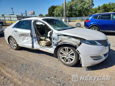 Czwarte zdjęcie samochodu z boku: 2015 LINCOLN MKZ VIN:3LN6L2G9XFR616181 - miniatura