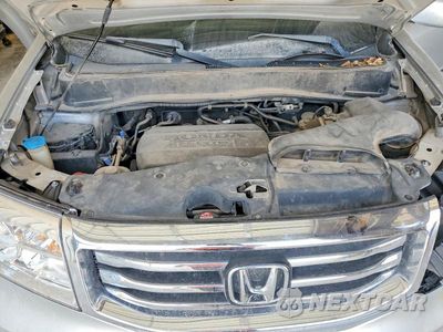 Zdjęcie 12 z 13 samochodu: 2015 HONDA PILOT TOURING VIN:5FNYF4H90FB007973 - miniatura