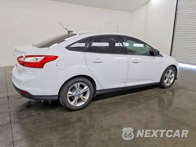 Trzecie zdjęcie samochodu z tyłu: 2013 FORD FOCUS SE VIN:1FADP3F26DL195281 - miniatura