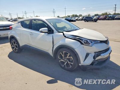 Czwarte zdjęcie samochodu z boku: 2019 TOYOTA C-HR XLE VIN:JTNKHMBX9K1041075 - miniatura