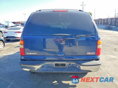 Zdjęcie 6 z 12 samochodu: 2003 GMC YUKON VIN:1GKEC13V93R264607 - miniatura