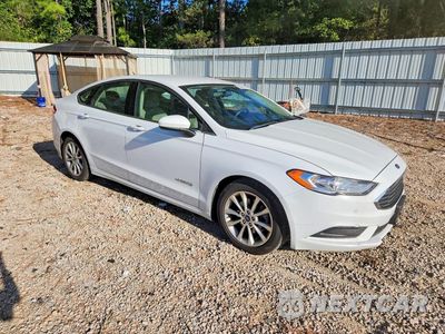 Czwarte zdjęcie samochodu z boku: 2017 FORD FUSION SE HYBRID VIN:3FA6P0LU6HR110959 - miniatura