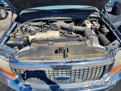 Zdjęcie 12 z 13 samochodu: 2000 FORD EXCURSION XLT VIN:1FMNU41S4YED08557 - miniatura