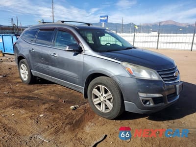 Czwarte zdjęcie samochodu z boku: 2013 CHEVROLET TRAVERSE LT VIN:1GNKVJKD5DJ137989 - miniatura