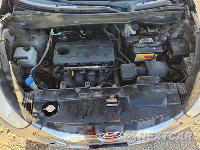 Zdjęcie 11 z 12 samochodu: 2012 HYUNDAI TUCSON LIMITED VIN:KM8JUCAC9CU382721 - miniatura