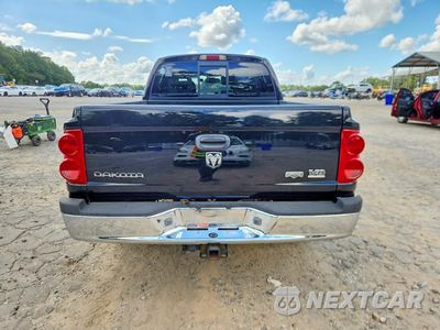 Zdjęcie 6 z 12 samochodu: 2005 DODGE DAKOTA QUAD LARAMIE VIN:1D7HE58NX5S230504 - miniatura