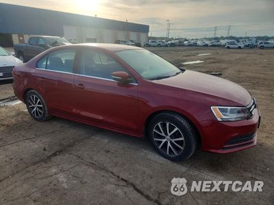 Czwarte zdjęcie samochodu z boku: 2016 VOLKSWAGEN JETTA SE VIN:3VWD67AJ7GM363576 - miniatura