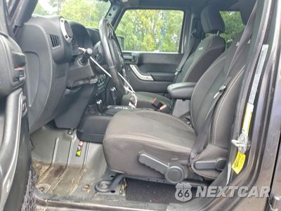Zdjęcie 7 z 12 samochodu: 2017 JEEP WRANGLER UNLIMITED SAHARA VIN:1C4BJWEG2HL507667 - miniatura