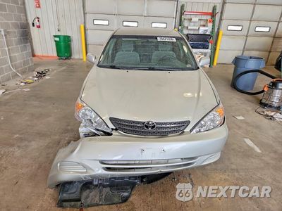 Piąte zdjęcie samochodu w środku: 2002 TOYOTA CAMRY LE VIN:4T1BE30K72U087349 - miniatura