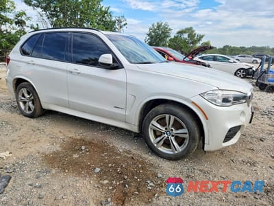 Czwarte zdjęcie samochodu z boku: 2015 BMW X5 XDRIVE50I VIN:5UXKR6C57F0J76043 - miniatura