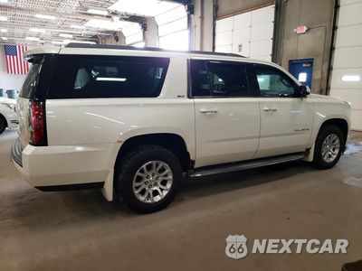 Trzecie zdjęcie samochodu z tyłu: 2015 GMC YUKON XL K1500 SLT VIN:1GKS2HKC3FR564260 - miniatura