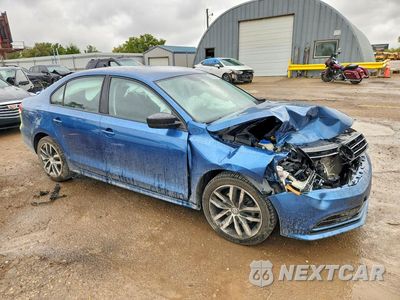 Czwarte zdjęcie samochodu z boku: 2015 VOLKSWAGEN JETTA SE VIN:3VWD17AJ7FM300359 - miniatura