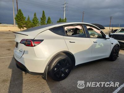 Trzecie zdjęcie samochodu z tyłu: 2023 TESLA MODEL Y VIN:7SAYGDEE1PF796623 - miniatura
