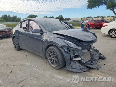 Czwarte zdjęcie samochodu z boku: 2025 TESLA MODEL Y VIN:7SAYGAEE2SF306214 - miniatura