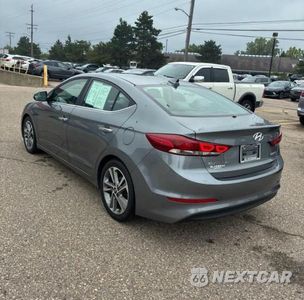 Trzecie zdjęcie samochodu z tyłu: 2017 HYUNDAI ELANTRA LIMITED VIN:KMHD84LF4HU061935 - miniatura