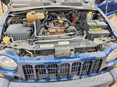 Zdjęcie 11 z 12 samochodu: 2005 JEEP LIBERTY SPORT VIN:1J4GL48575W601997 - miniatura
