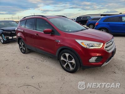 Czwarte zdjęcie samochodu z boku: 2018 FORD ESCAPE SEL VIN:1FMCU0HD8JUD36395 - miniatura