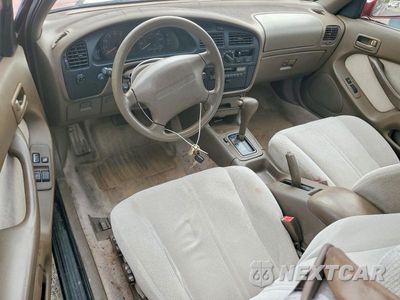 Zdjęcie 8 z 12 samochodu: 1995 TOYOTA CAMRY LE VIN:4T1SK12C6SU634534 - miniatura