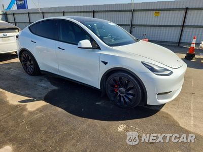 Czwarte zdjęcie samochodu z boku: 2022 TESLA MODEL Y VIN:7SAYGDEF7NF410230 - miniatura