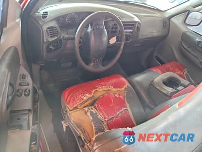Zdjęcie 8 z 13 samochodu: 2000 FORD F150 VIN:2FTRX07L5YCA70858 - miniatura