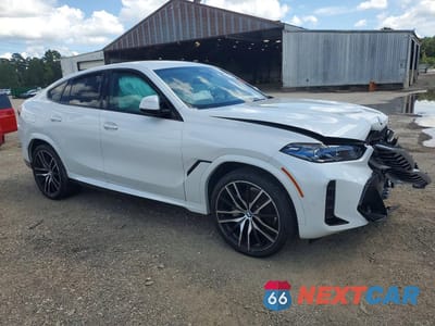 Czwarte zdjęcie samochodu z boku: 2026 BMW X6 XDRIVE40I VIN:5UX33EX0XT9222664 - miniatura