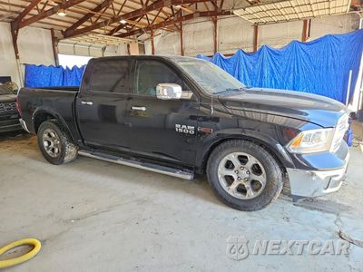 Czwarte zdjęcie samochodu z boku: 2014 RAM 1500 LARAMIE VIN:1C6RR7NM5ES476166 - miniatura