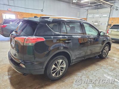 Trzecie zdjęcie samochodu z tyłu: 2018 TOYOTA RAV4 HYBRID XLE VIN:JTMRJREV2JD210879 - miniatura