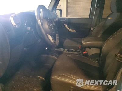Zdjęcie 7 z 12 samochodu: 2014 JEEP WRANGLER UNLIMITED SAHARA VIN:1C4BJWEG7EL219946 - miniatura
