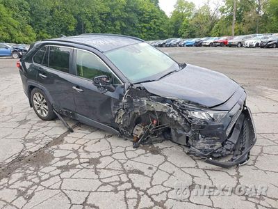 Czwarte zdjęcie samochodu z boku: 2021 TOYOTA RAV4 LIMITED VIN:JTMN1RFV1MD070342 - miniatura