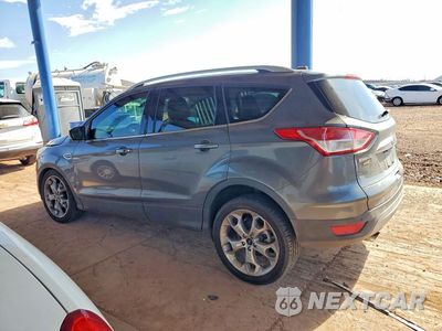 Drugie zdjęcie samochodu z przodu: 2014 FORD ESCAPE TITANIUM VIN:1FMCU0J92EUB31876 - miniatura