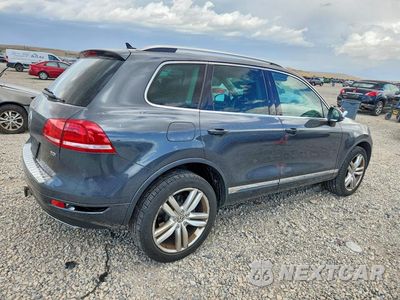 Trzecie zdjęcie samochodu z tyłu: 2014 VOLKSWAGEN TOUAREG V6 TDI VIN:WVGEP9BP7ED001478 - miniatura