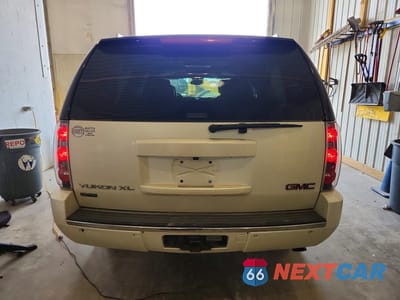 Zdjęcie 6 z 13 samochodu: 2010 GMC YUKON XL DENALI VIN:1GKUKMEF2AR223819 - miniatura