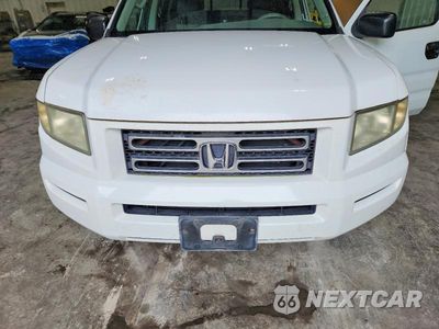 Zdjęcie 11 z 12 samochodu: 2006 HONDA RIDGELINE RT VIN:2HJYK16216H533017 - miniatura