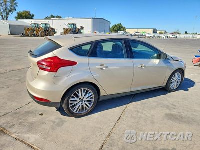 Trzecie zdjęcie samochodu z tyłu: 2018 FORD FOCUS TITANIUM VIN:1FADP3N28JL253338 - miniatura