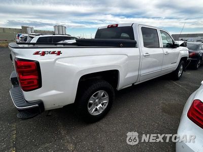 Trzecie zdjęcie samochodu z tyłu: 2018 CHEVROLET SILVERADO K1500 LT VIN:3GCUKREC2JG364209 - miniatura