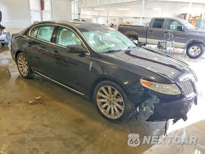 Czwarte zdjęcie samochodu z boku: 2011 LINCOLN MKS VIN:1LNHL9FT5BG607114 - miniatura