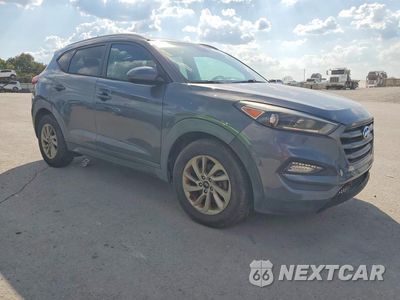 Czwarte zdjęcie samochodu z boku: 2016 HYUNDAI TUCSON SE VIN:KM8J33A4XGU088150 - miniatura