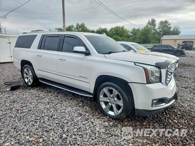 Czwarte zdjęcie samochodu z boku: 2020 GMC YUKON XL DENALI VIN:1GKS2HKJ0LR128055 - miniatura