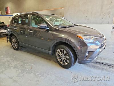 Czwarte zdjęcie samochodu z boku: 2018 TOYOTA RAV4 LIMITED VIN:JTMDFREV1JJ261223 - miniatura