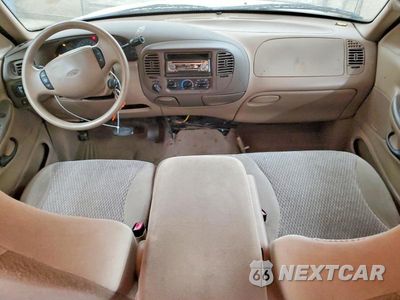 Zdjęcie 8 z 14 samochodu: 1999 FORD EXPEDITION VIN:1FMPU18L4XLA33580 - miniatura