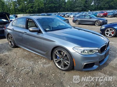 Czwarte zdjęcie samochodu z boku: 2020 BMW M550XI VIN:WBAJS7C0XLBN96498 - miniatura