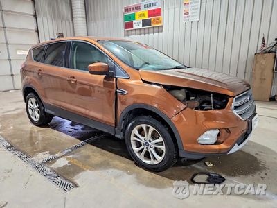 Czwarte zdjęcie samochodu z boku: 2017 FORD ESCAPE SE VIN:1FMCU9G99HUB04688 - miniatura
