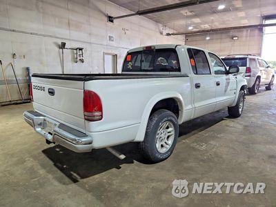 Trzecie zdjęcie samochodu z tyłu: 2002 DODGE DAKOTA QUAD SLT VIN:1B7HL48N42S652239 - miniatura